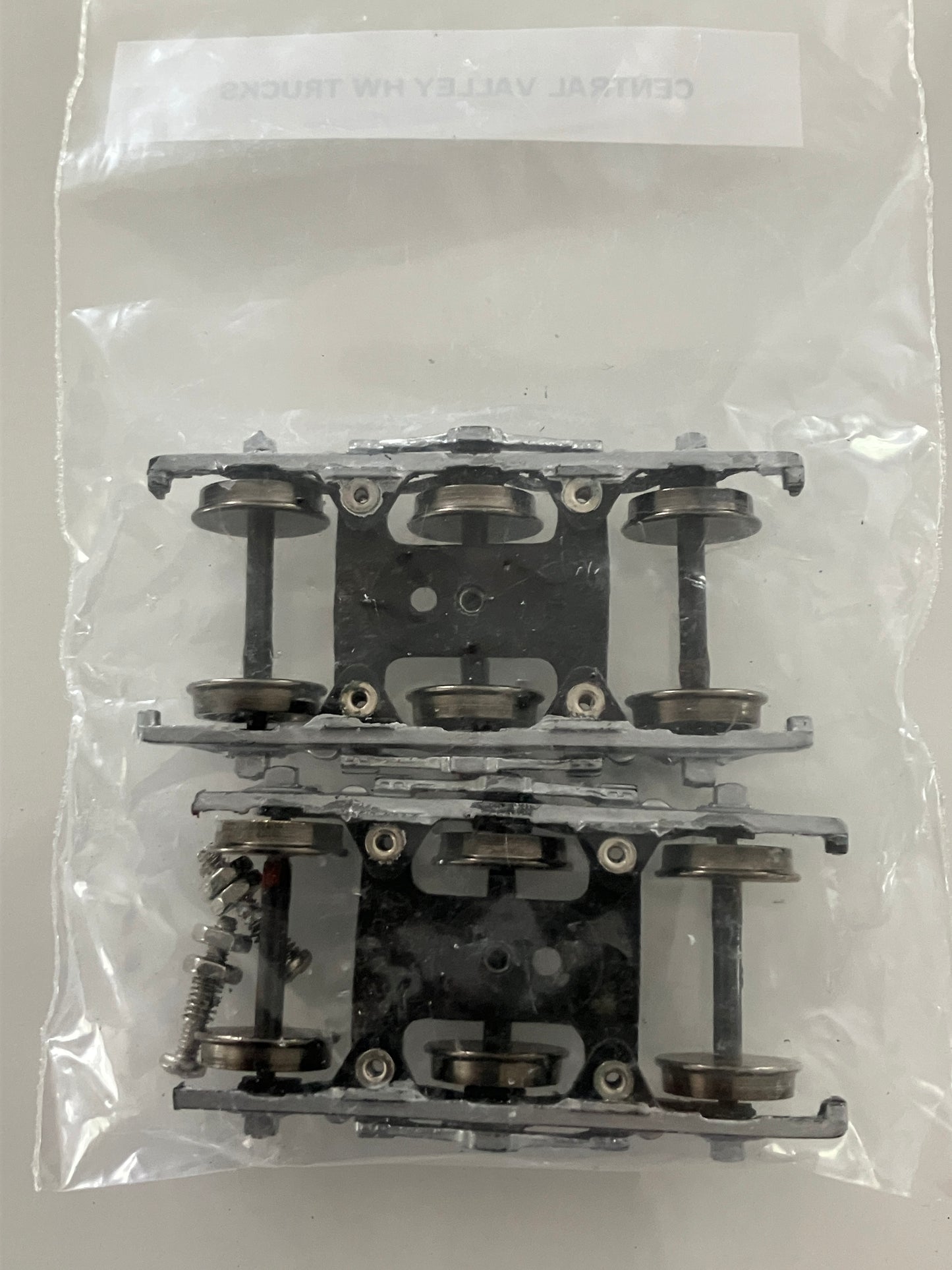 LSC008 Central Valley 3-axle Passenger Car Trucks, painted silver w/mounting screws