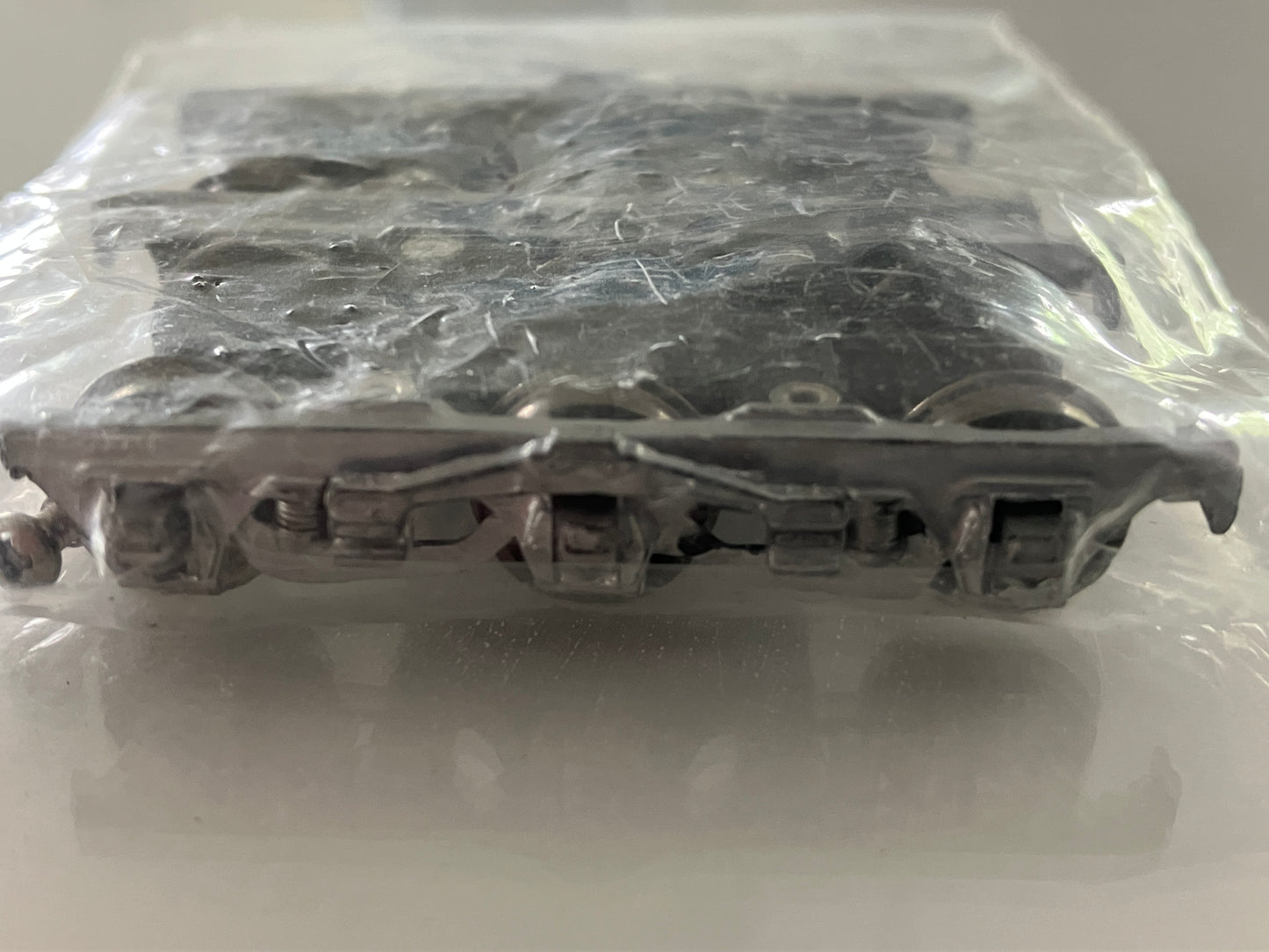 LSC008 Central Valley 3-axle Passenger Car Trucks, painted silver w/mounting screws
